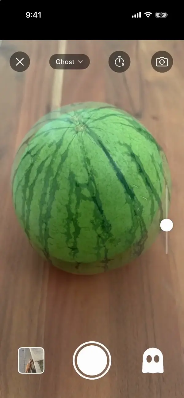 The camera in Ghost mode, with an earlier photo faint over the live view